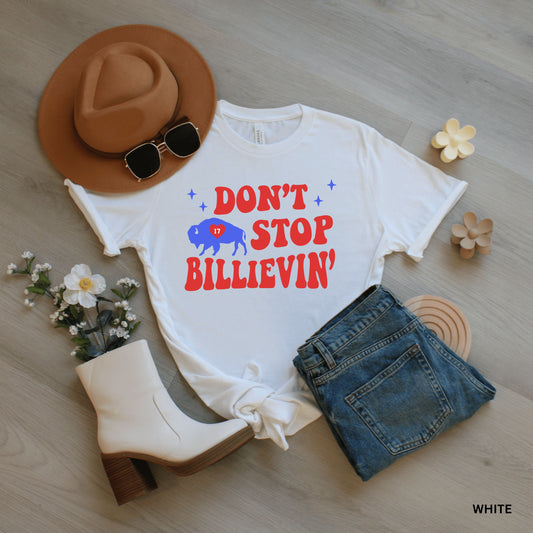 a t - shirt that says don't stop billievin with a cowboy