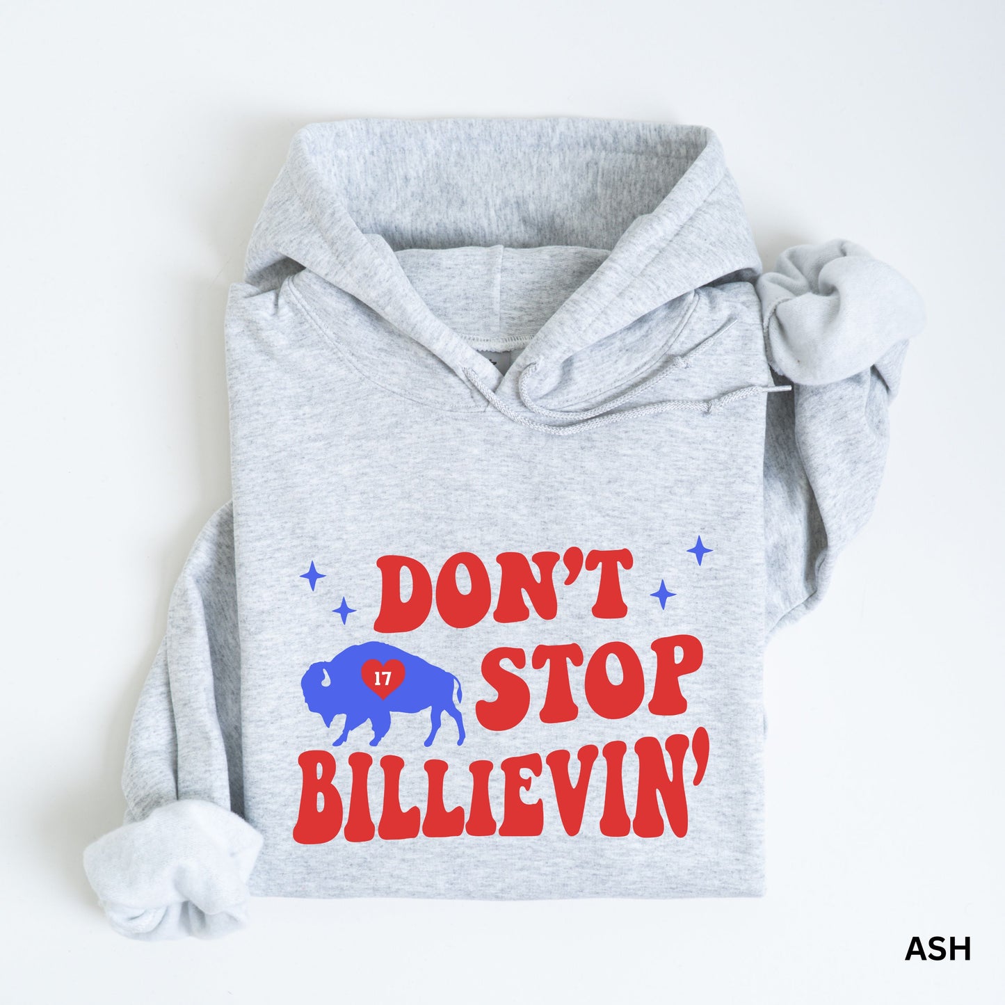 a dog wearing a hoodie with the words don't stop and a buffalo