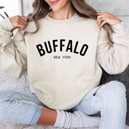 a woman wearing a sweatshirt that says buffalo new york