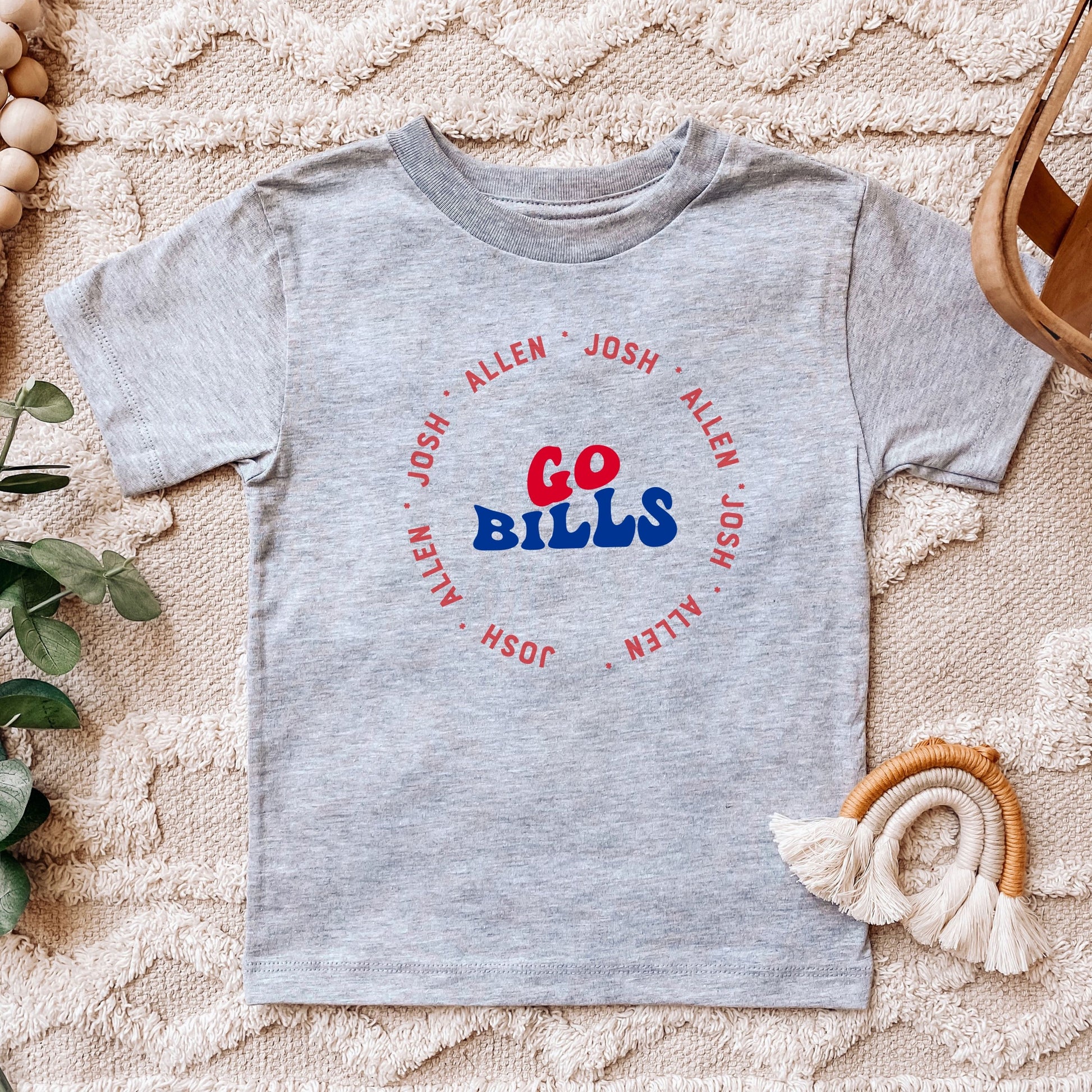 a t - shirt with the words go bulls printed on it