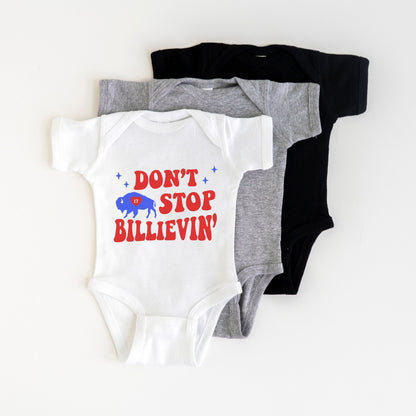 three onesuits with the words don't stop billivin printed on