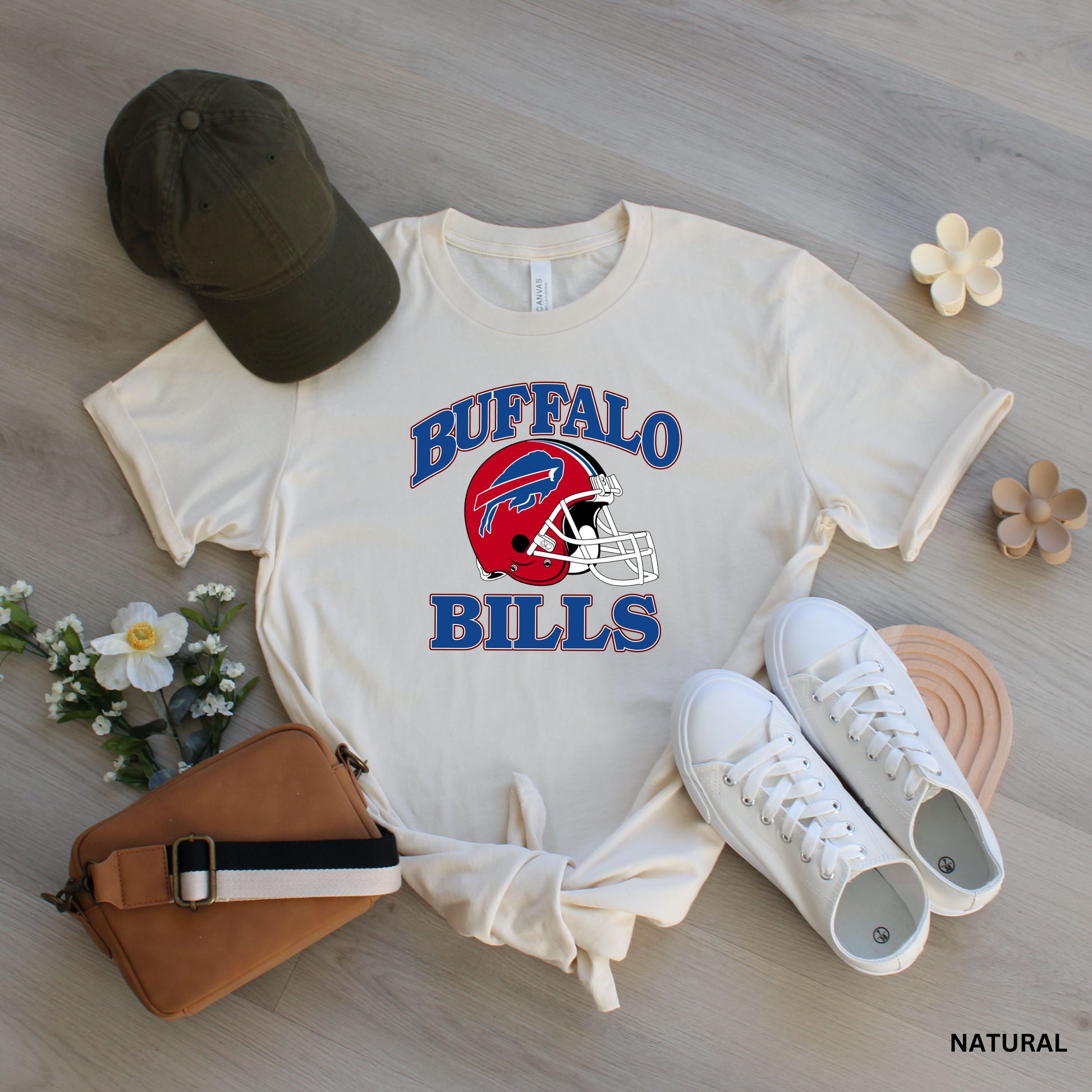 a buffalo bills t - shirt with a football helmet on it