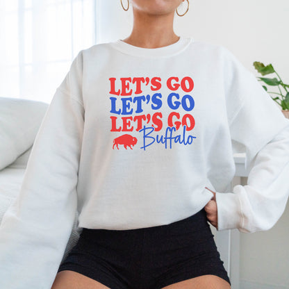 a woman wearing a sweatshirt that says let's go let's go buffalo